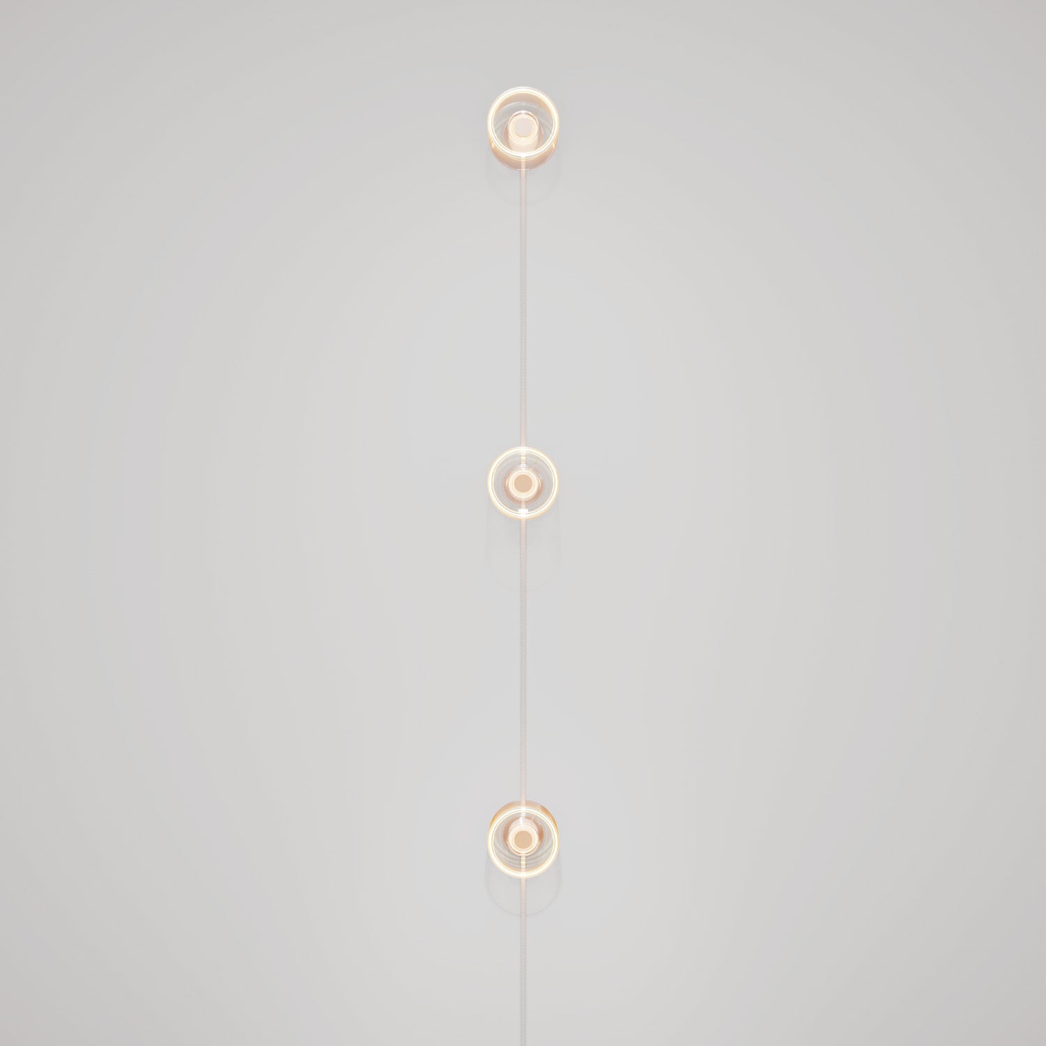 Lampada da parete Spostaluce con spina, 3 lampadine Ghost e cavo grigio melange